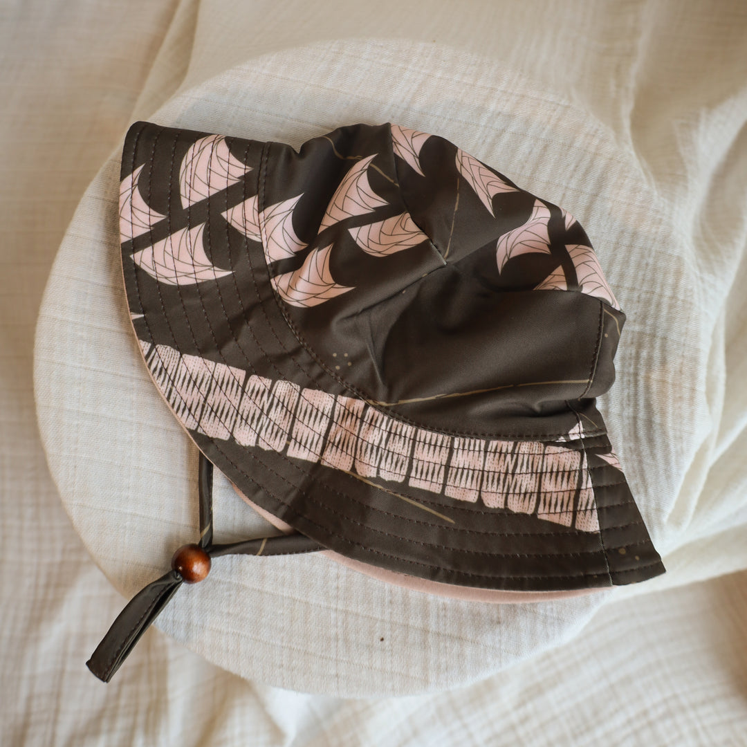The Liko Bucket Hat | Adjustable Baby Sun Hat with Cotton Canvas Lining | NĀKI'I Ā PA'A - Pe'a